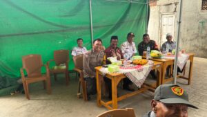 Sinergitas TNI-Polri Kawal Pemilihan Ketua RW 05 Kelurahan Harapan Mulya